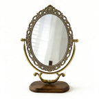 Vintage Oval Vanity Mirror with Ornate Brass Frame and Wooden Base